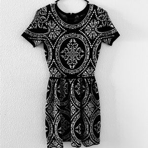 Romeo & Juliet Couture sweater dress above knee, short sleeves , scoop neck.